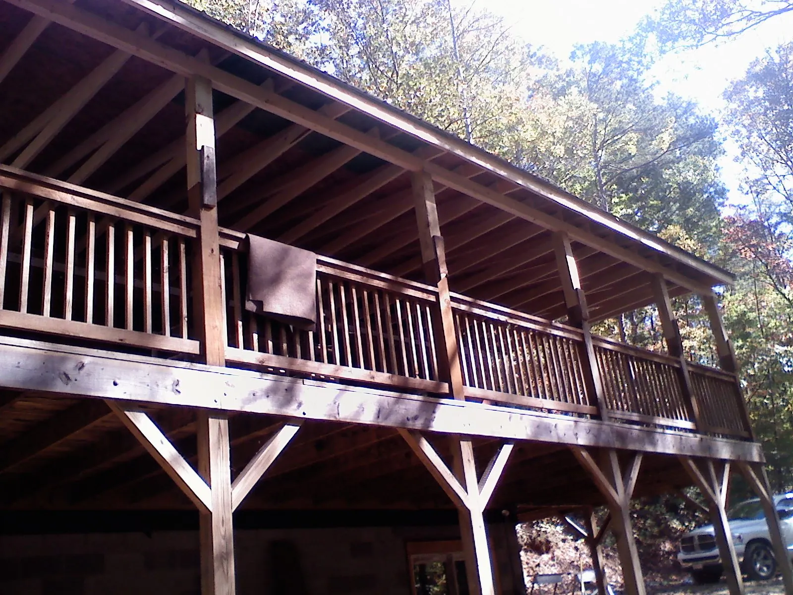 Timber framing under a new elevated porch and deck — Roof Leak Repair in Kirkland by Roofing Brothers